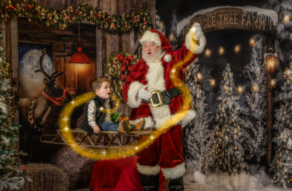 Boy amazed while riding the magical sled with Santa’s magic