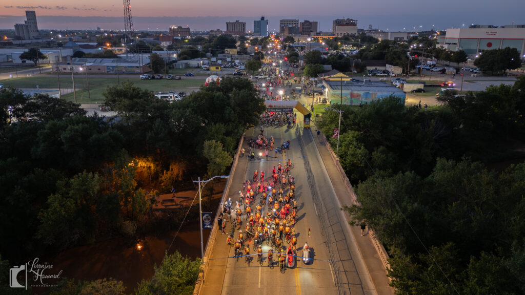Drone view of thousands of cyclists rolling through Wichita Falls at Hotter’N Hell Hundred 2025.