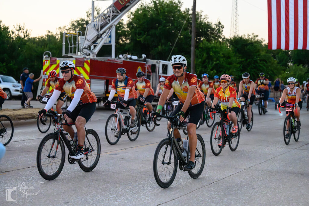 Determined cyclist riding during Hotter’N Hell Hundred 2025 in Wichita Falls, Texas.