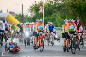 Cyclists heading out of the start area at Hotter'N Hell Hundred 2025.