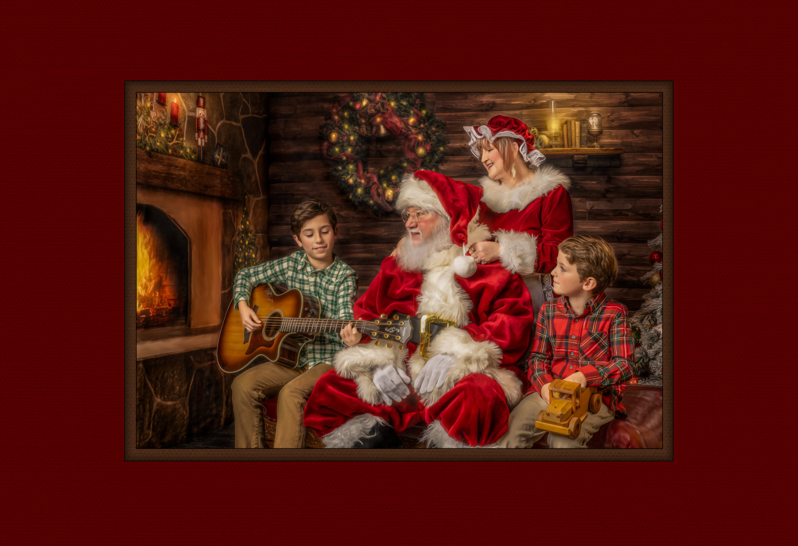 Children playing music for Santa and Mrs. Claus during Santa Session in Wichita Falls photography studio